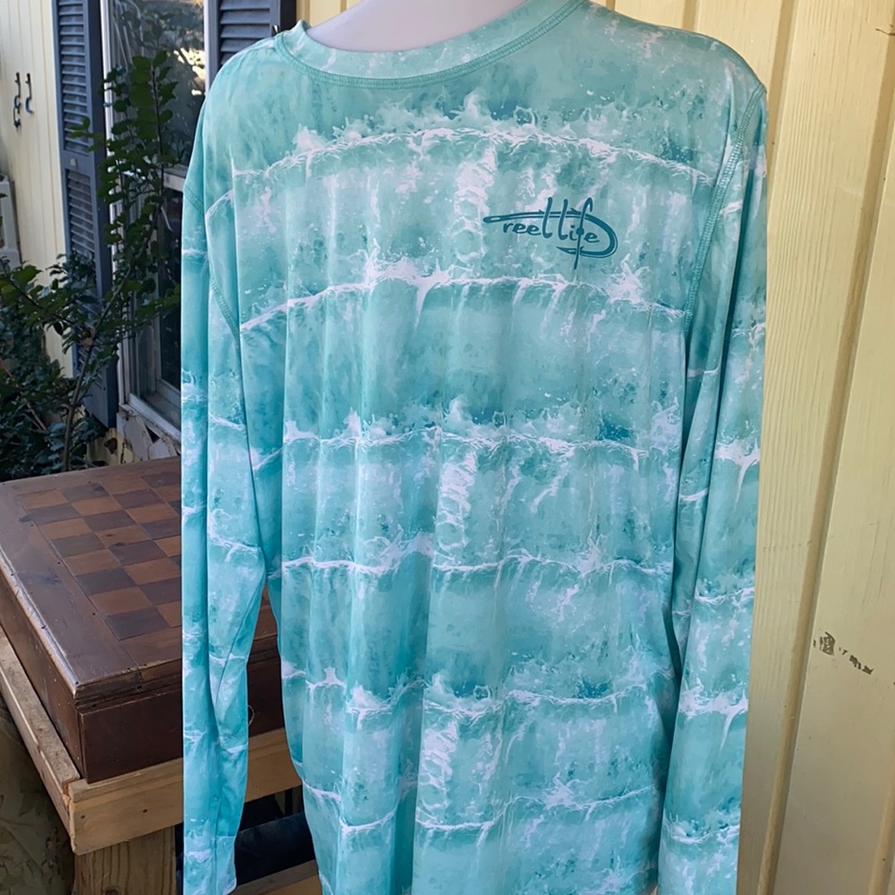 Men’s reel life sun defender shirt